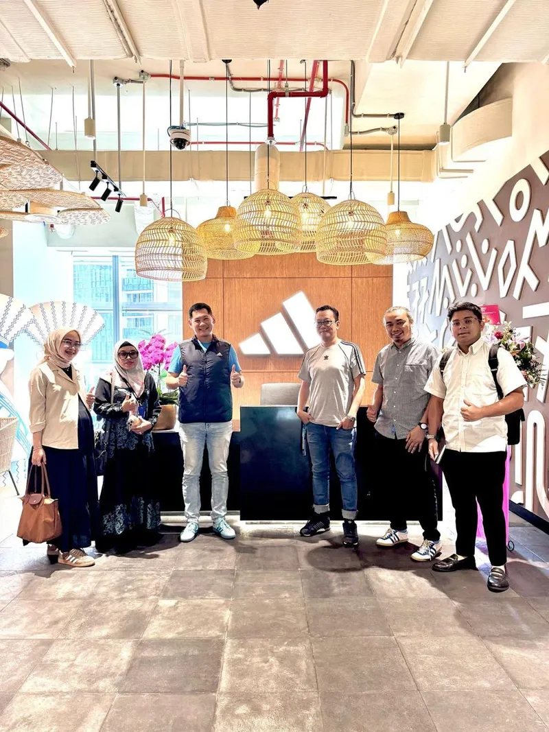 The Amalia Utama team at our Adidas storefront display